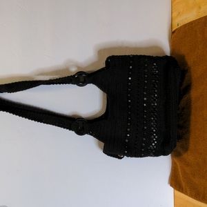 Small black macrame purse.